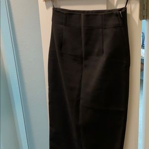 Flattering calf length black skirt